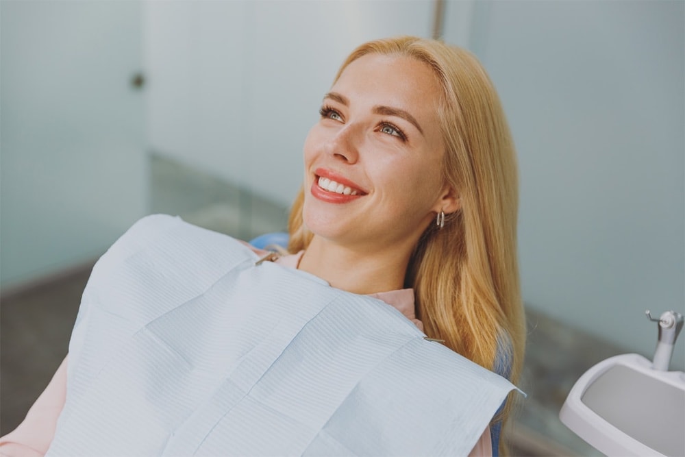 Woman smiling in dental chair
